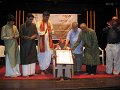 Senior vocalist B.S.Vijayaraghavan receiving Ananya Puraskara